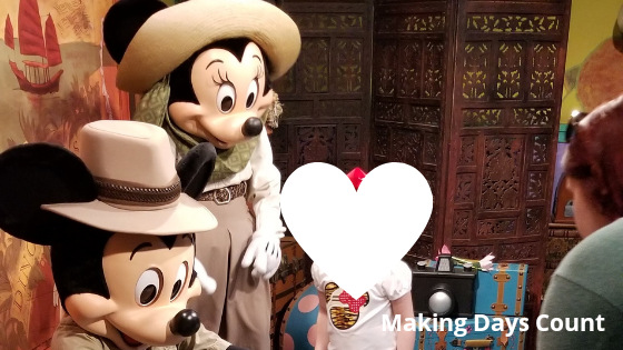 Mickey and Minnie- Animal Kingdom with a baby