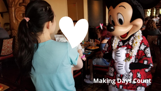 Picture of us meeting Mickey at the Ohana restaurant 